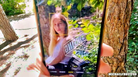 Blonde beauty outdoors tempted by stranger's dick pic
