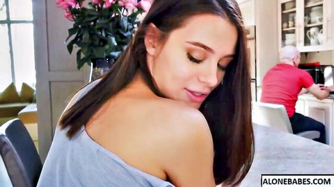Lana Rhoades seductive glance over shoulder in off-shoulder top, intruder in background