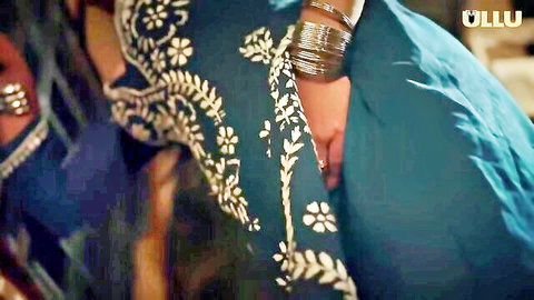 Sexy Indian bhabhi teasing with big cleavage in blue ethnic dress