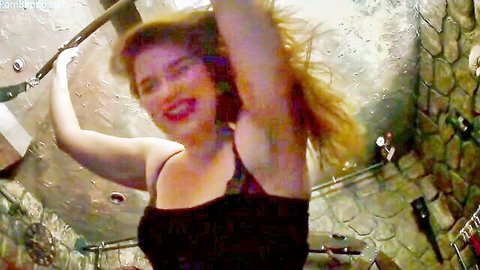 Giantess Amazon Kali in black lingerie, arms raised dominantly, making you feel small