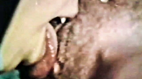 Retro prison girl giving intense blowjob close-up, O.Z. Films style