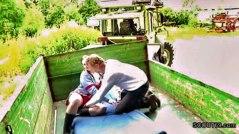 German MILF bound in truck bed for outdoor cuckold sex with blond man