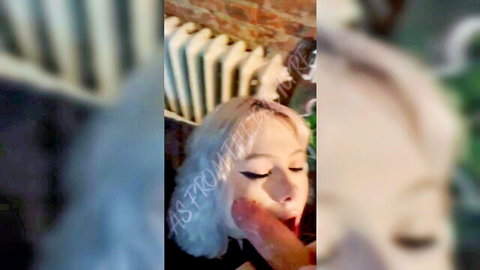 Amateur pale blonde woman giving intense blowjob closeup