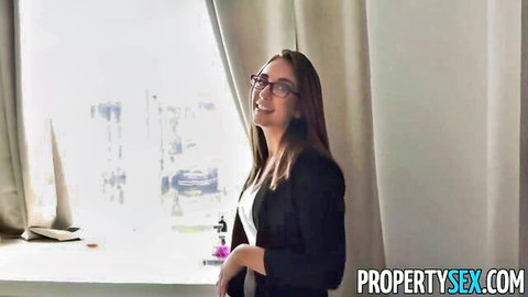 Layla London curvy brunette in glasses and office blazer smiling seductively