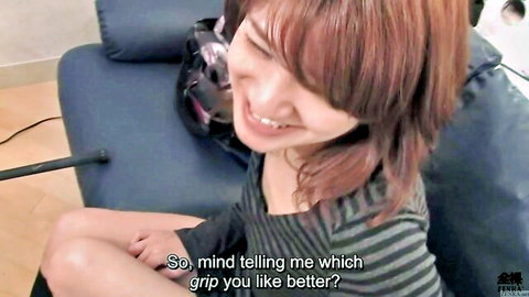 Smiling Japanese redhead in gray shirt asks about golf grip, Zenra JAV thumbnail