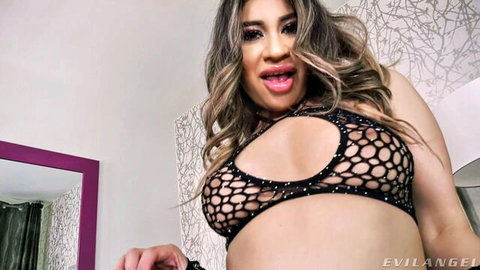 Latina seductress in sheer mesh top exposes curves, tongue out tease