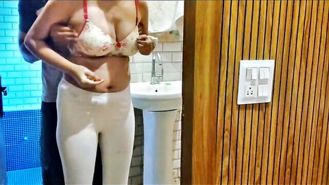 Horny Indian housewife in pink bra teased by repairman in bathroom