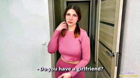 Freckled redhead with pigtails in tight pink bodysuit teases 'Do you have a girlfriend?' from doorway