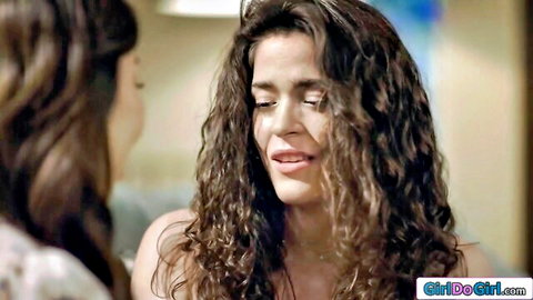 Curly-haired brunette reconnects emotionally with fiancee in intimate girl-on-girl moment