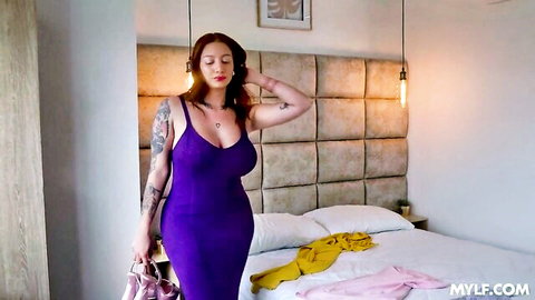 Devil Khloe, stunning brunette in tight purple dress, teasing with tattoos