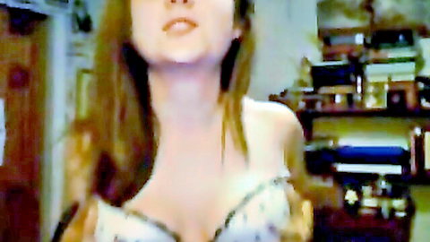 Cute teen chick with long brown hair strips off her lacy bra on webcam