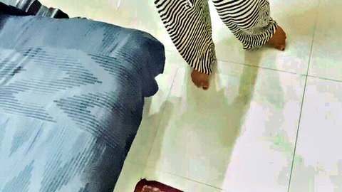 Indian bhabhi's bare feet in striped pants teasing near bed