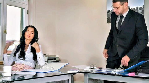 Ania Kinski as seductive horny boss in office attire