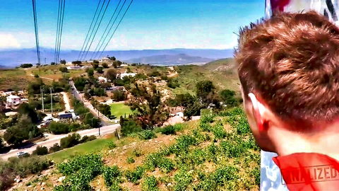 Redhead voyeur overlooking blonde PAWG neighborhood from hilltop
