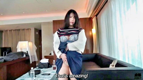 Chubby Asian teen lifting skirt to reveal blue lingerie in hotel room POV