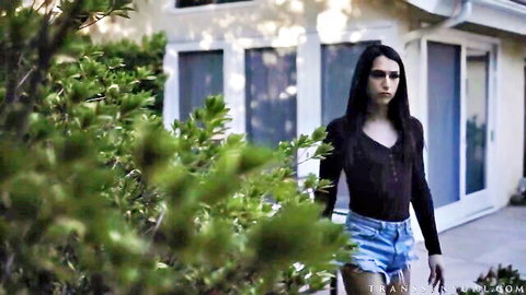 Khloe Kay teases in black top and denim shorts outdoors