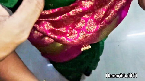 Tamil Desi Bhabhi lifting pink saree revealing thighs in hot scene
