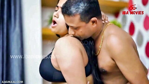 Indian chubby woman in black bra receives passionate neck kiss from shirtless man