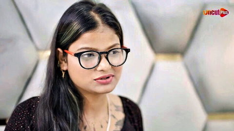 Seductive Indian woman in glasses and revealing top for hot make-out scene