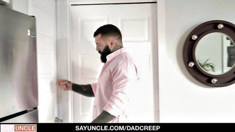 Tattooed bearded stepdad in pink shirt, gay Valentine's Day scene