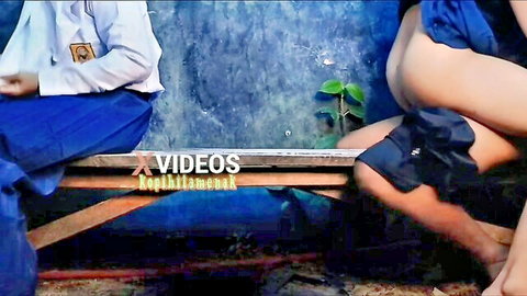 Asian schoolgirl upskirt flashing ass beside man after school