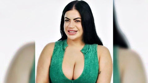 Thick Latina in low-cut green dress showing massive cleavage POV tease