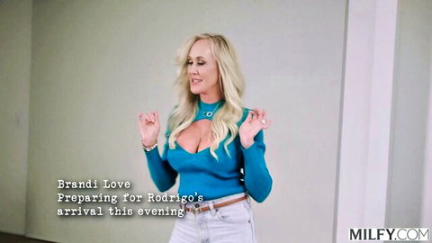 Blonde MILF Brandi Love teases massive cleavage in tight blue top preparing for Rodrigo's arrival