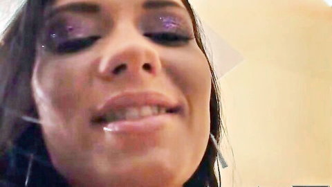 Veronica's close-up with glossy lips and purple eyeshadow in gonzo sucking scene