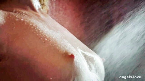 Wet nude teen breast close-up in shower with visible nipple
