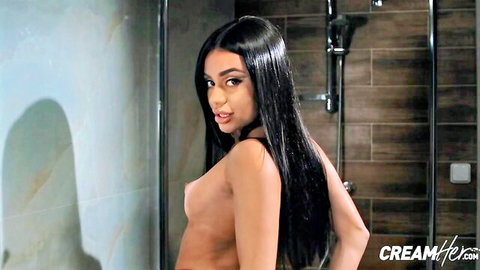 Martina Smeraldi topless in shower, long black hair, seductive pose