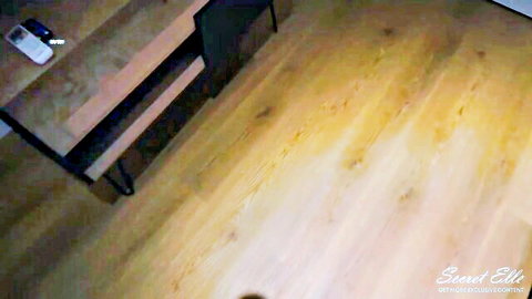Empty amateur room with wooden table, chair and floor setup for homemade taboo MILF sex video