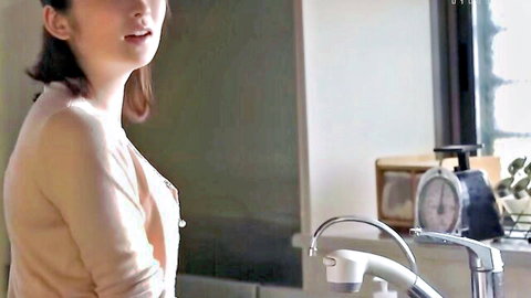 Asian woman in open cardigan by kitchen sink, teasing gaze, JAV boss affair scene