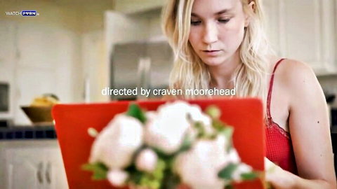 Blonde Claire Roos in red lingerie gazing at laptop in MissaX's Cat and Mouse