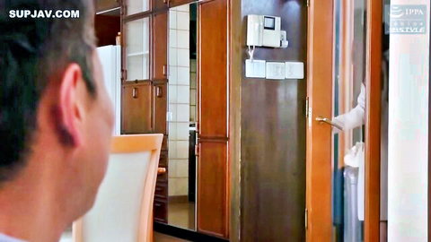 Lina Paige as shared wife extends gloved hand to stranger in JAV