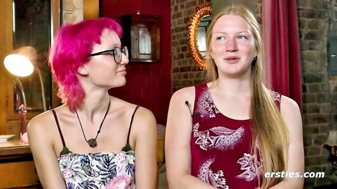 Ersties Zoe T with pink hair and glasses chats with blonde Tonja