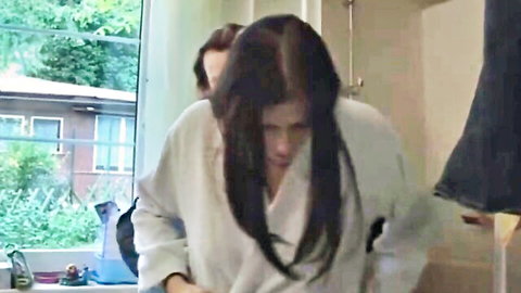 Beautiful Klara in open white robe, intimate embrace from behind