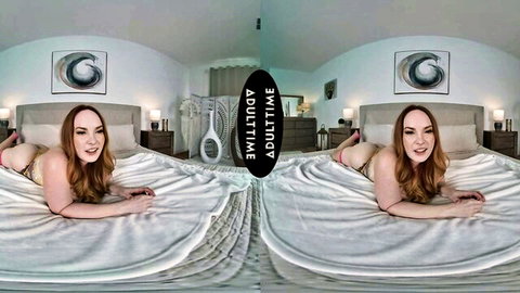 Summer Hart redhead MILF in pink lingerie, seductive VR POV pose on bed