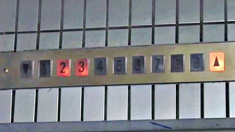 Housekeeper Natsuko JAV thumbnail showing lit elevator panel