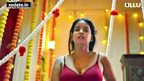 Seductive Indian woman in pink bra, busty figure, long dark hair