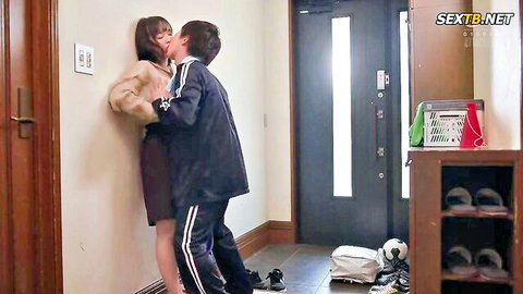 Passionate wall kiss between MILF and young soccer coach in JAV affair scene