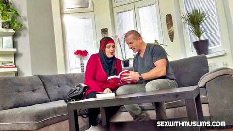Aisha Bahadur in red hijab seduces white man in Muslim porn scene