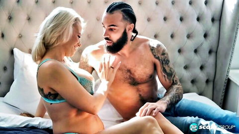 Skinny blonde with small tits in turquoise bra groped by tattooed dreadlocked stud on bed