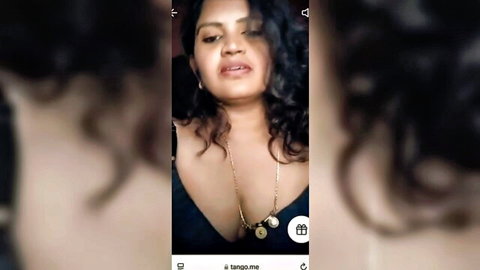 Curvy Tamil aunty cleavage tease on Tango live