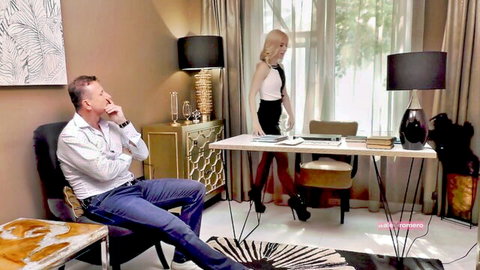 Blonde stepmom in tight skirt poses by desk with stepson in office