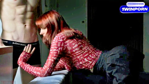 The LyMia redhead in mesh top giving blowjob to muscular stud