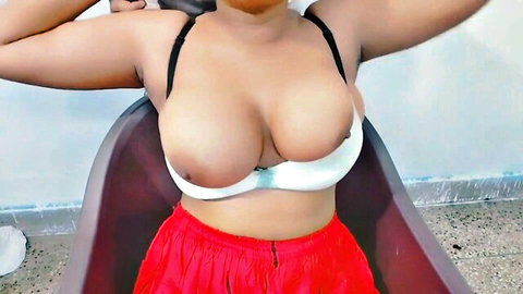 Xxxsoniya teases with huge breasts in white bra and red skirt