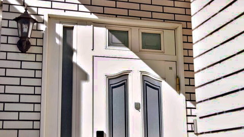 Koyoi Konan JAV scene at elegant white door entrance with lantern