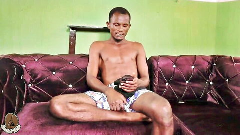 African Zara shirtless muscular black man sitting in shorts, solo adult teaser