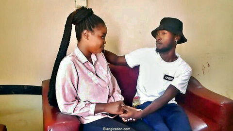 Intimate ebony couple holding hands, close embrace
