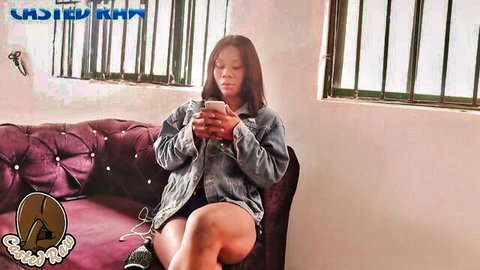Ebony African woman with big ass in denim jacket, seductive pose